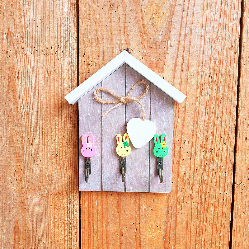 Verspielte Kaninchen Thema Wandhakenregal