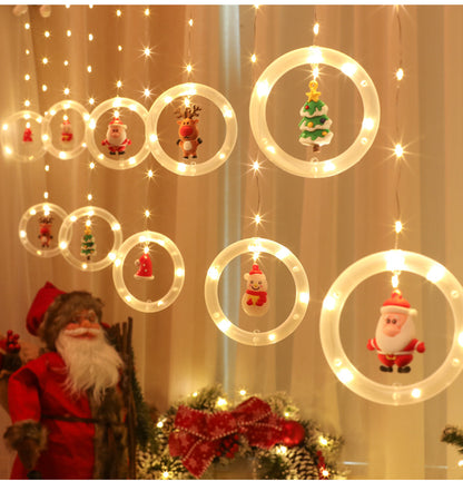LED-Lichtervorhang mit weihnachtlichen Motiven