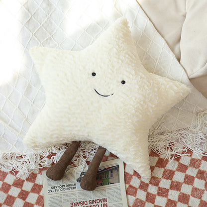 Dekorative Kuschelkissen mit Mond-, Stern- und Sonnenmotiv