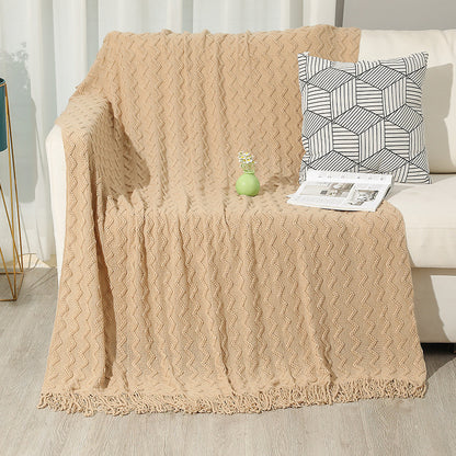 Gestrickte Sofadecke mit Wellenmuster