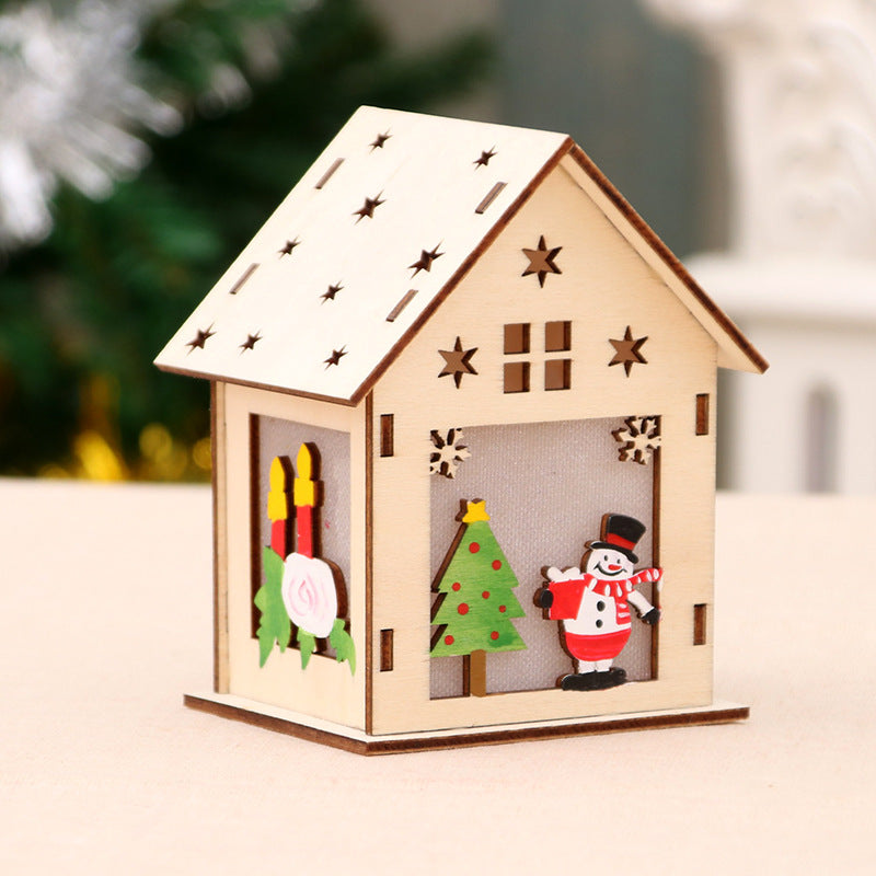 Beleuchtetes Holz-Weihnachtshaus, dekorativ
