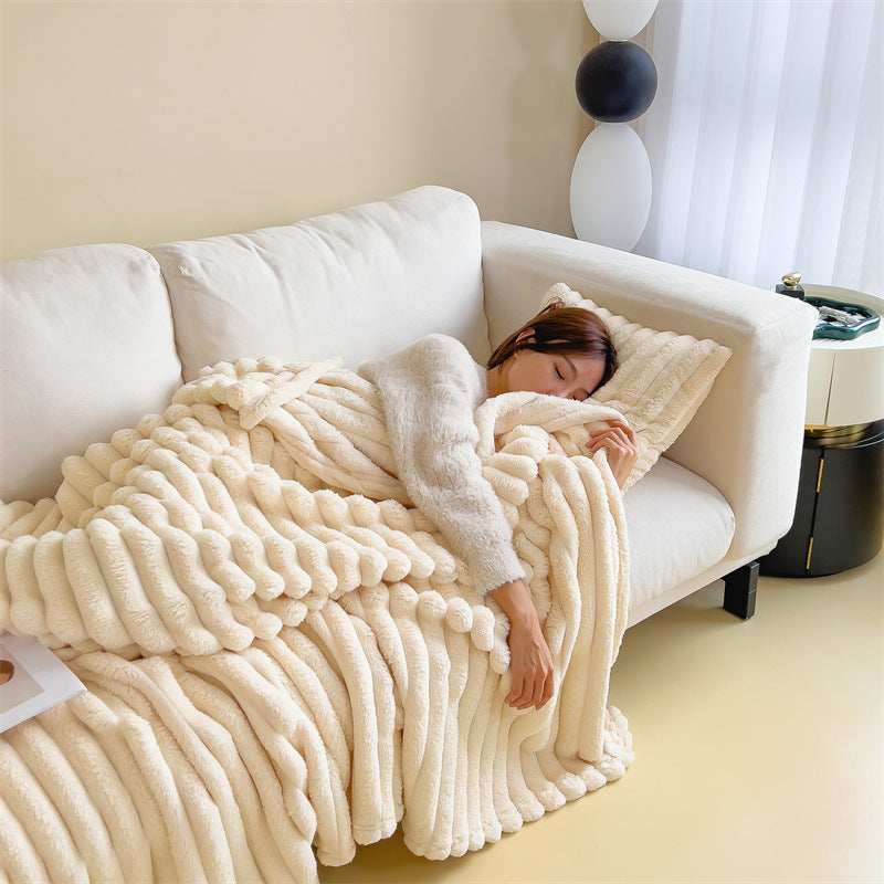 Wärmende Kuscheldecke in Kaninchenfell-Optik