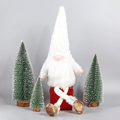 Weihnachts-Wichtelfigur mit langen Beinen, sitzend