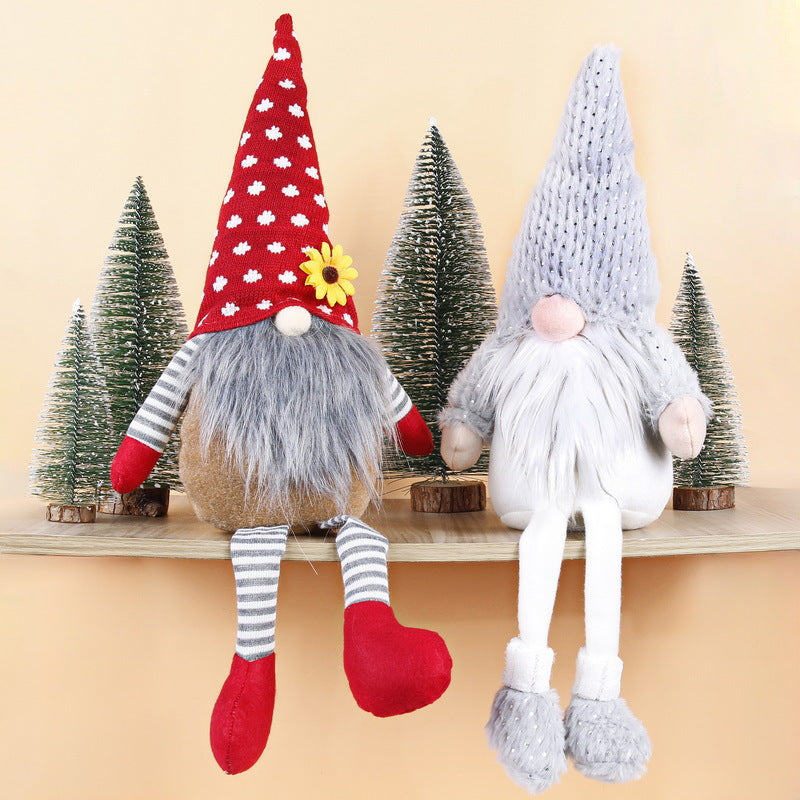Weihnachts-Wichtelfigur mit langen Beinen, sitzend