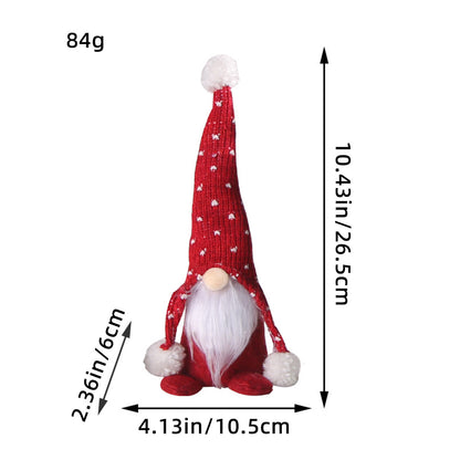 Weihnachtswichtel mit Strickmütze und Bommel
