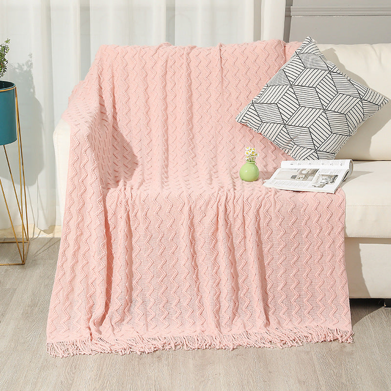 Gestrickte Sofadecke mit Wellenmuster