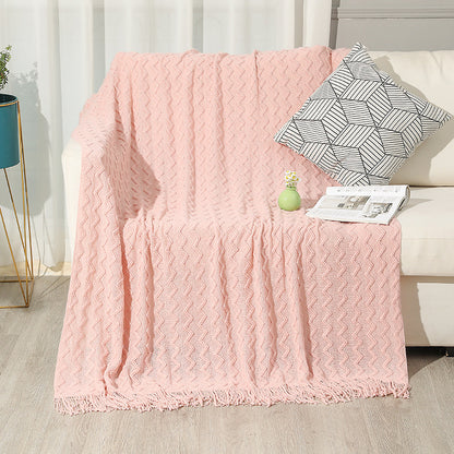 Gestrickte Sofadecke mit Wellenmuster