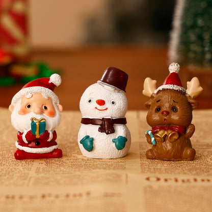 Dekorative Weihnachtsfiguren aus Kunstharz