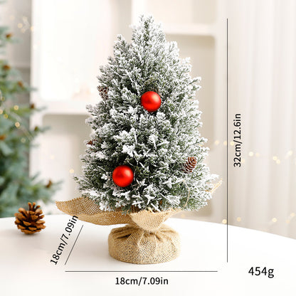 Dekorative Mini-Weihnachtsbäume im Topf