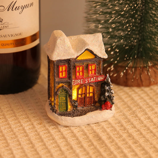 Beleuchtete Häuser aus Kunstharz zur Weihnachtsdekoration