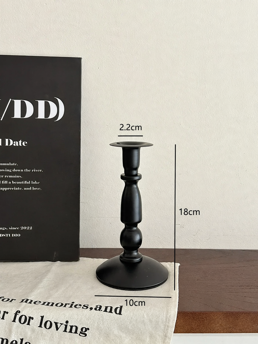 Dekorativer Kerzenhalter aus Glas und Holz
