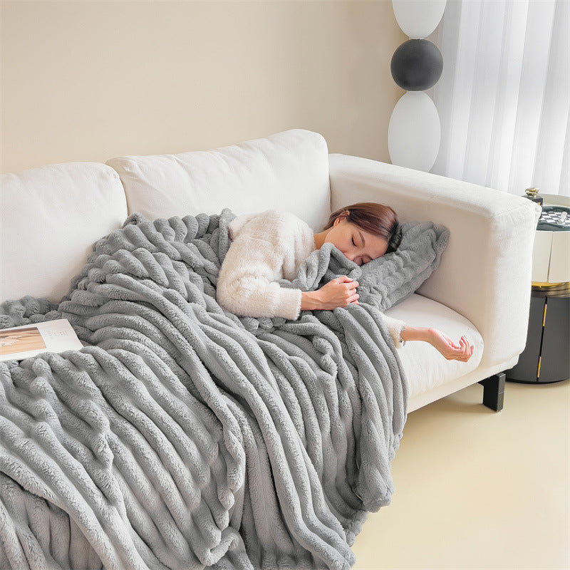 Wärmende Kuscheldecke in Kaninchenfell-Optik