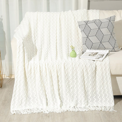 Gestrickte Sofadecke mit Wellenmuster