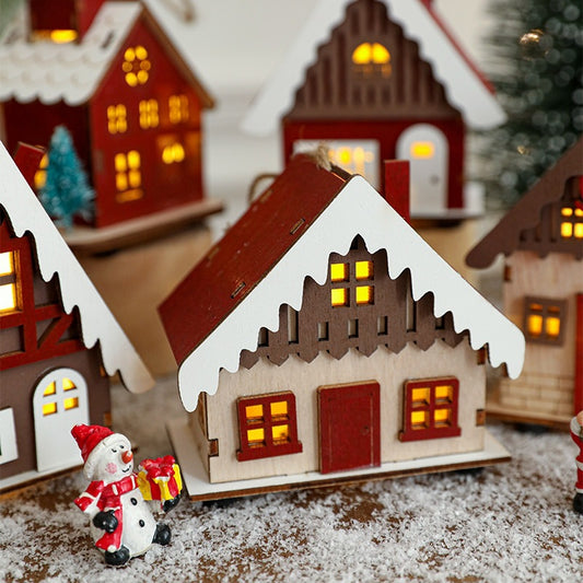 Beleuchtetes Holzhaus für die Weihnachtszeit