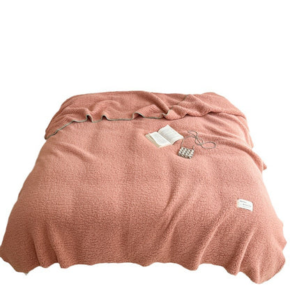 Flauschige Wohndecke mit Muschelsaum