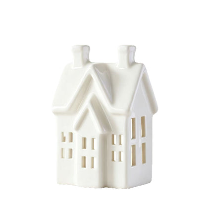 Dekoratives Kerzenhaus aus weißem Porzellan