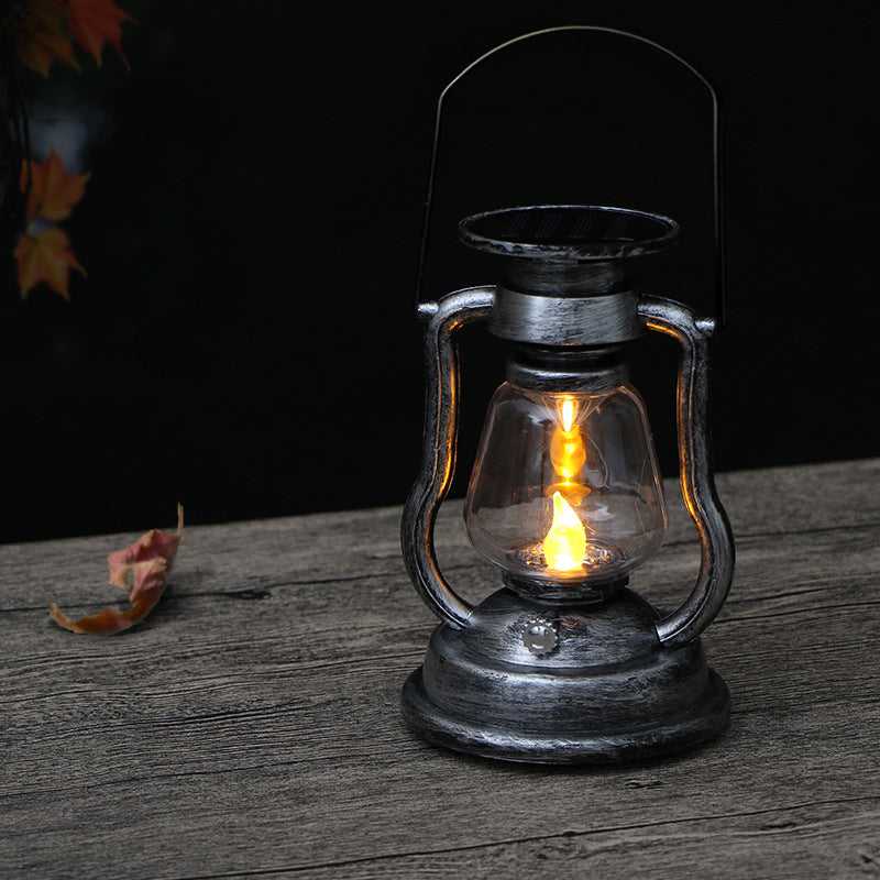 Antike inspirierte Solar-LED-Lampe mit Glasglocke und Metallgriff Brehn