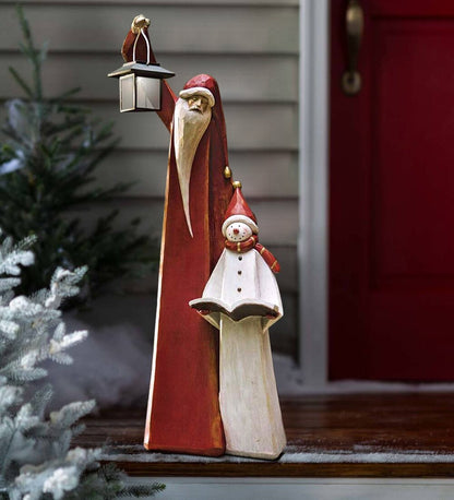 Weihnachtsmann- und Schneemann-Skulptur