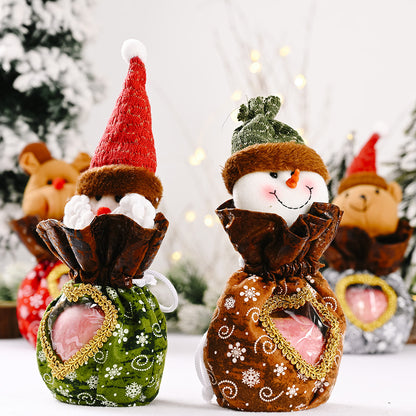 Niedliche Weihnachtsfigur mit Herzbeutel Brehn