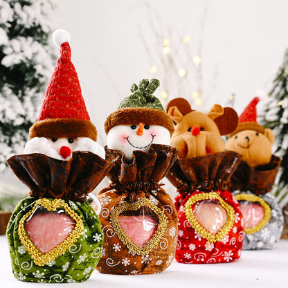 Niedliche Weihnachtsfigur mit Herzbeutel Brehn