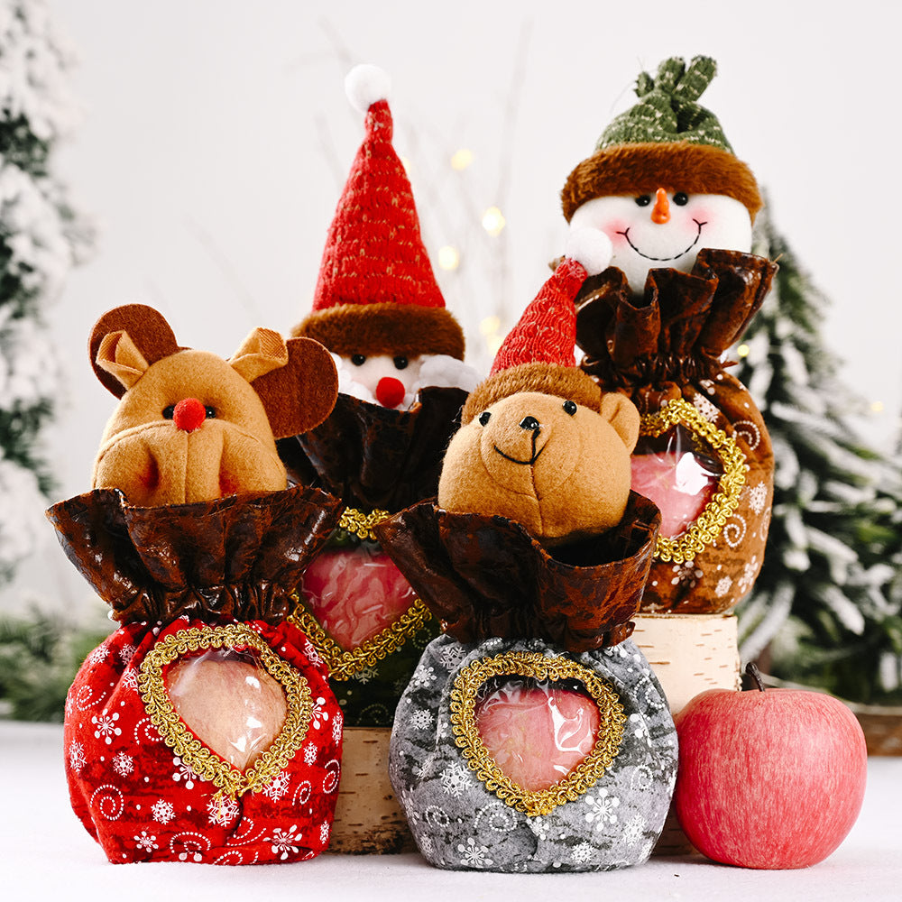 Niedliche Weihnachtsfigur mit Herzbeutel Brehn