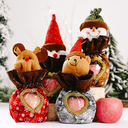 Niedliche Weihnachtsfigur mit Herzbeutel Brehn