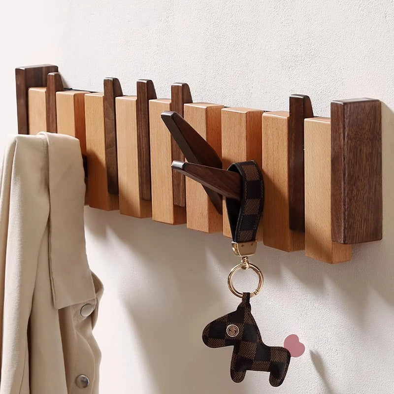 Holzgarderobe im Piano-Design mit klappbaren Haken | Brehn