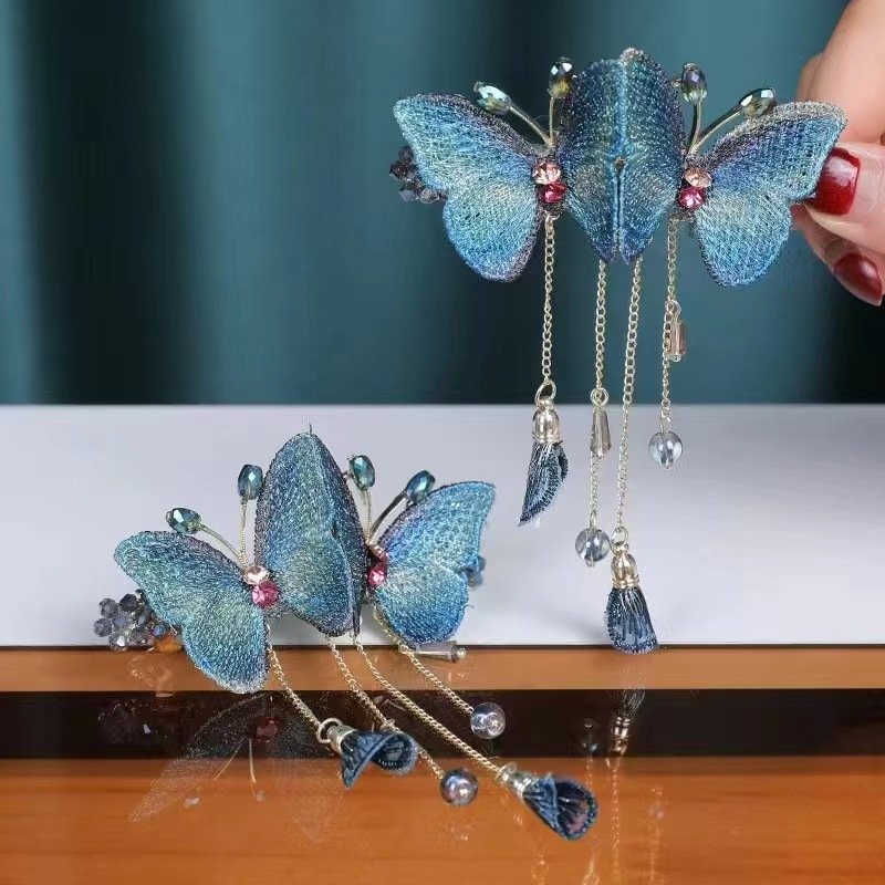 Brehn | Verträumte Schmetterling Haarspange mit Fransen