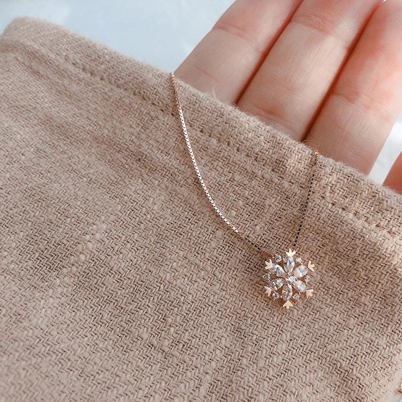 Glänzende Schneeflocke Kette
