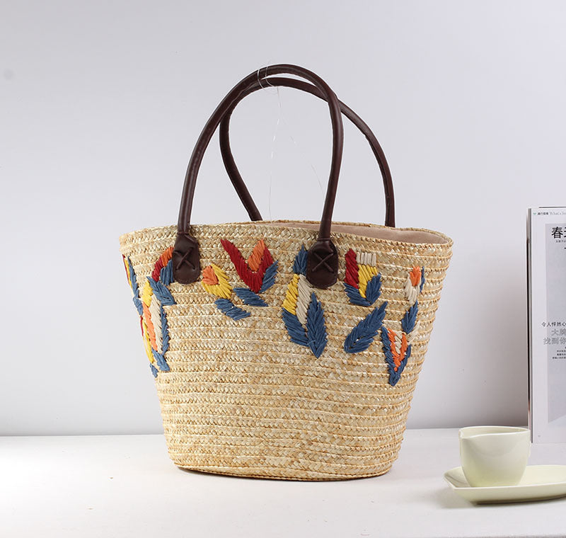 Geflochtene Strandtasche mit Farbenfrohem Stickmuster Brehn