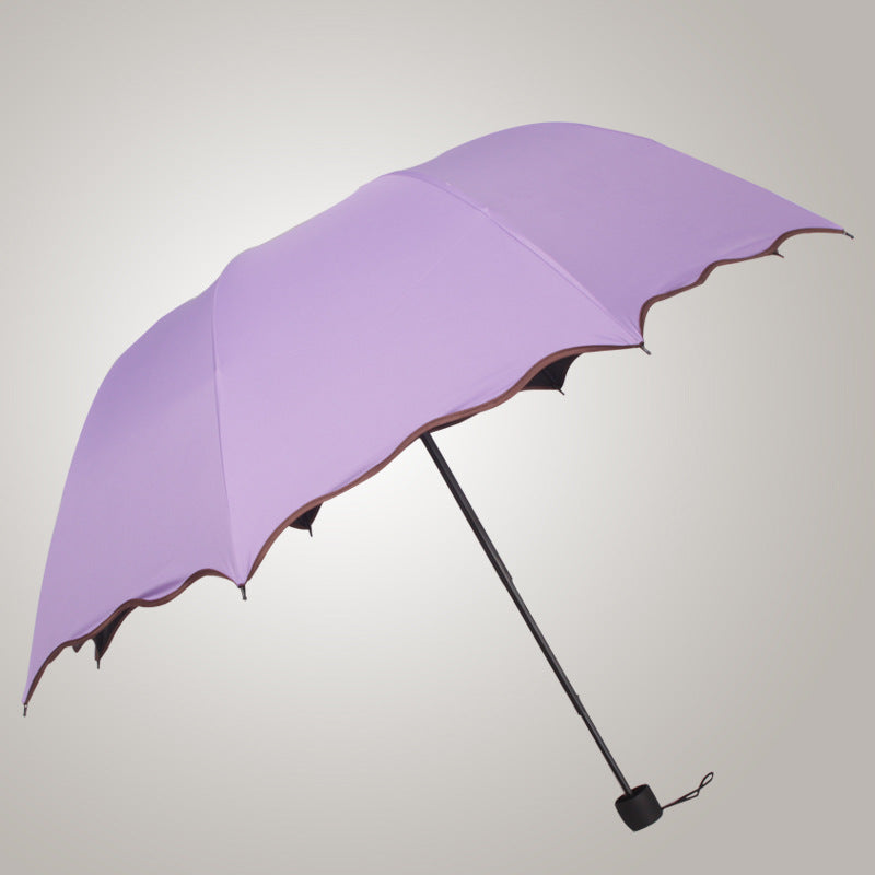 Damen kreativer Falt-Regenschirm mit eleganter Welle Brehn