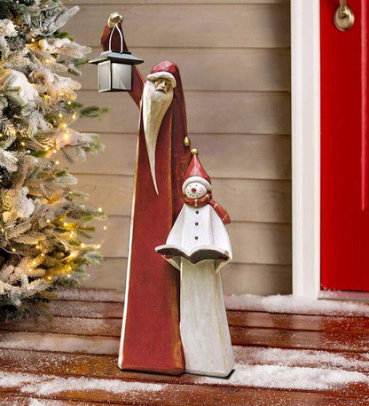 Weihnachtsmann- und Schneemann-Skulptur