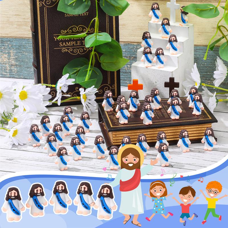 Mini-Jesusfiguren mit dem Slogan „Jesus liebt dich“