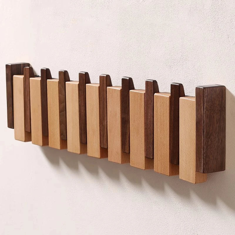 Holzgarderobe im Piano-Design mit klappbaren Haken | Brehn