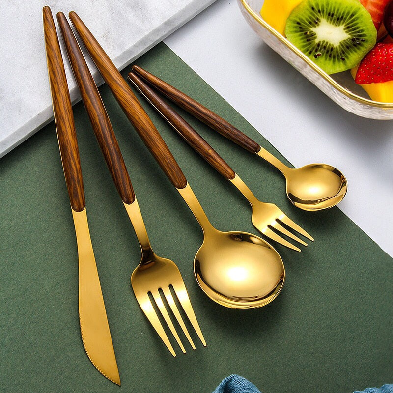 Elegantes Holzhantel Goldbesteckset für anspruchsvolles Essen