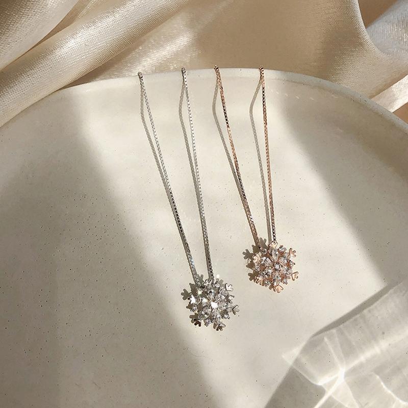 Glänzende Schneeflocke Kette