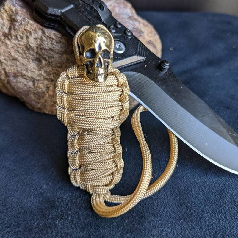 Paracord-Schlüsselanhänger, Mumienschädel aus Messing