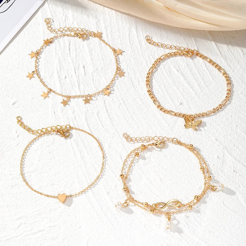 Brehn | 5-teiliges zierliches feminines Fußkettchen-Set (Sterne, Herz, Schmetterling, Unendlichkeit, Perlen)