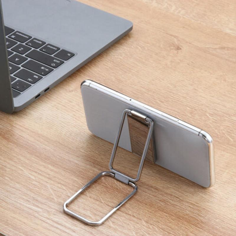 Neuer faltbarer Metalltelefonhalter | Brehn