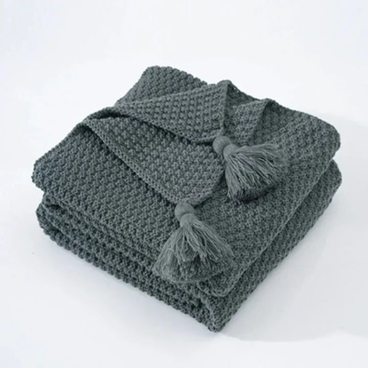 Brehn | Gestrickte Wolldecke mit Quasten - NordicCozy