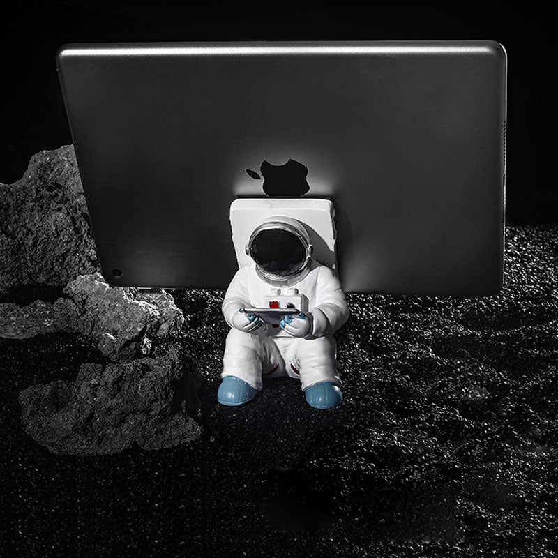 Unterstützung für Mobiltelefon oder Stift in Astronautendekorationen | Brehn