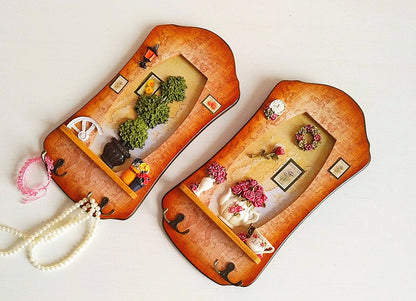Dekorativer Wandorganizer mit floralem Muster