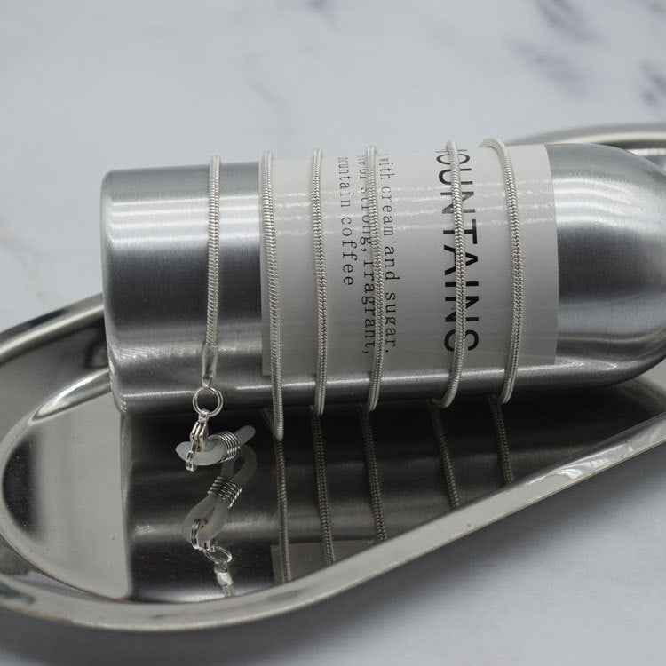Schlanker Brillenhalter aus Edelstahl Brehn