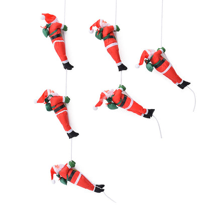 Dekorative Weihnachtsmannfiguren im Leiter-Set
