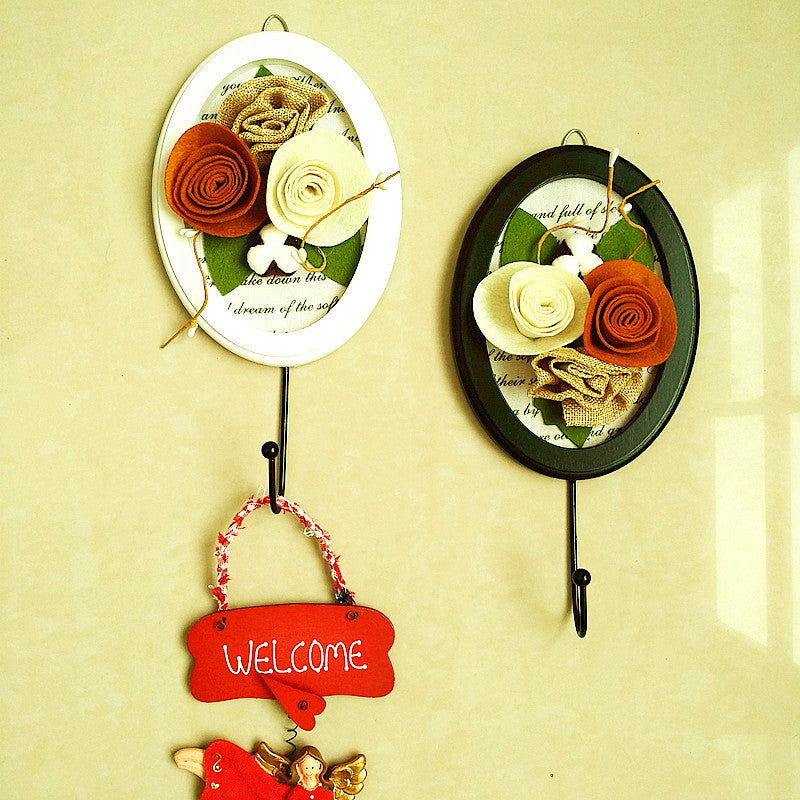 Dekorativer Wandhaken mit Blumendesign