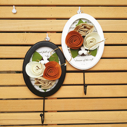 Dekorativer Wandhaken mit Blumendesign