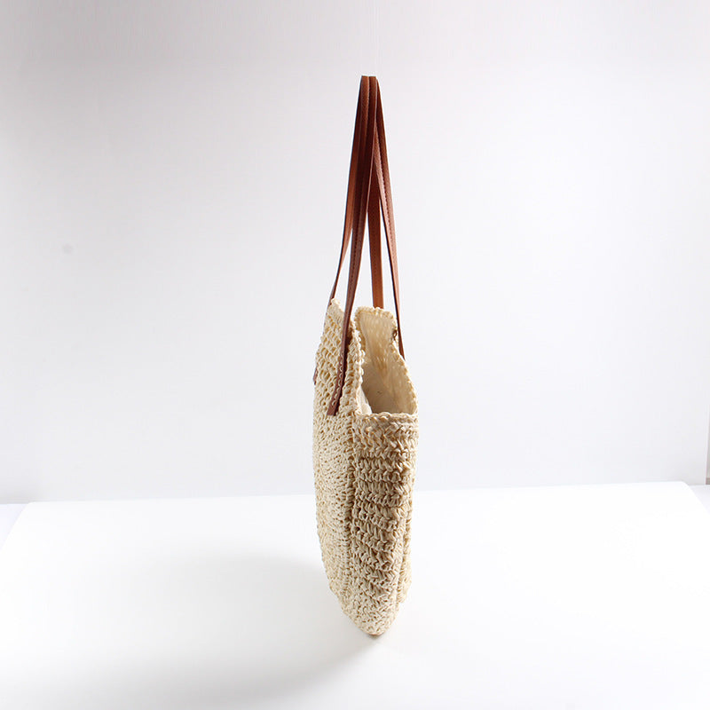Runde Basttasche mit Eleganten Ledergriffen Brehn