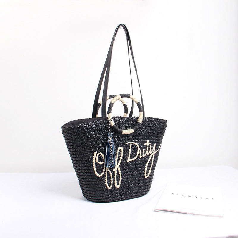 Designer Basttasche mit Verspieltem Schriftzug und Dekorativem Tassel Brehn