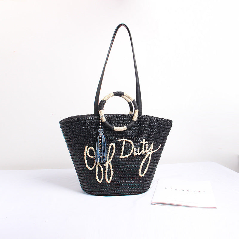 Designer Basttasche mit Verspieltem Schriftzug und Dekorativem Tassel Brehn