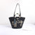 Designer Basttasche mit Verspieltem Schriftzug und Dekorativem Tassel Brehn